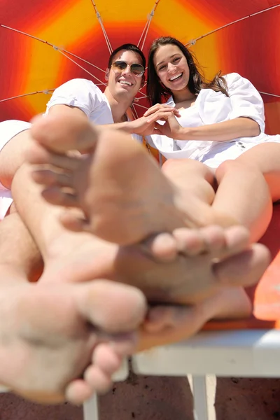 Couple under umbrella — Stock Photo, Image