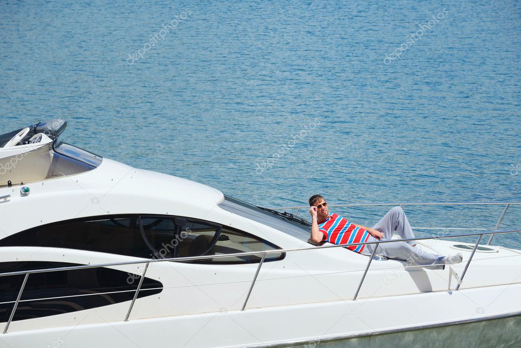 young couple on yacht