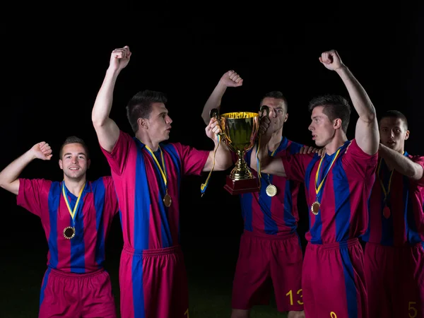 Soccer players celebrating victory — Stock Photo, Image