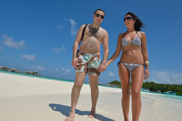 Couple have fun on beach — Stock Photo, Image