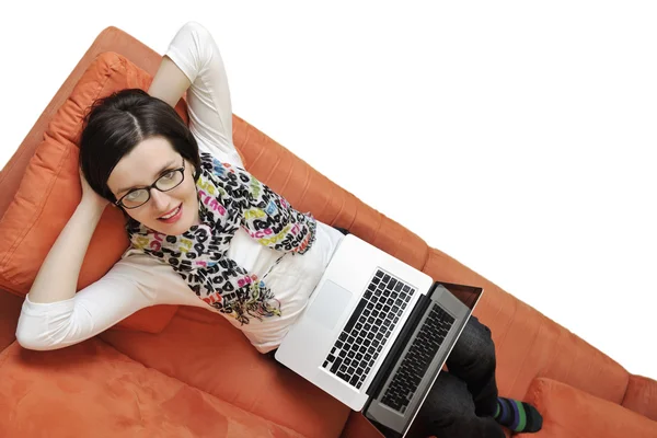 Woman using a laptop computer — Stock Photo, Image