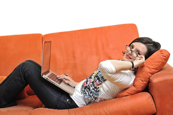 Woman using a laptop computer — Stock Photo, Image