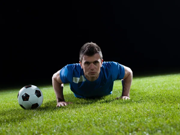 Jugador de fútbol y pelota — Foto de Stock