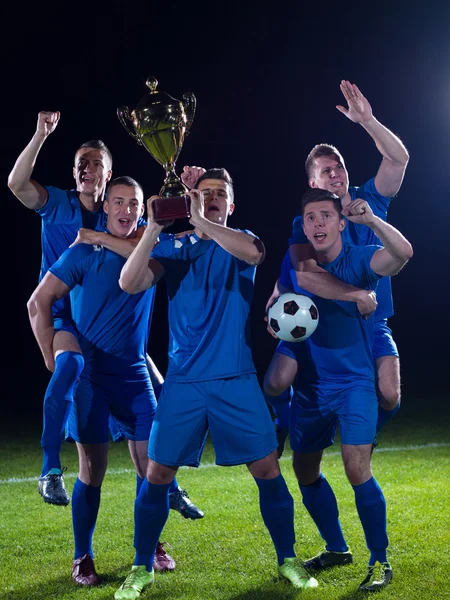 Soccer players celebrating victory — Stock Photo, Image