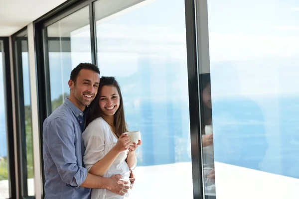 Relaxed young couple at home — Stock Photo, Image