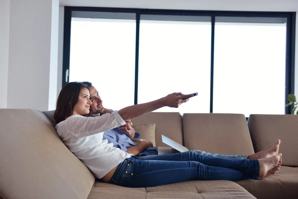 Couple on sofa — Stock Photo, Image