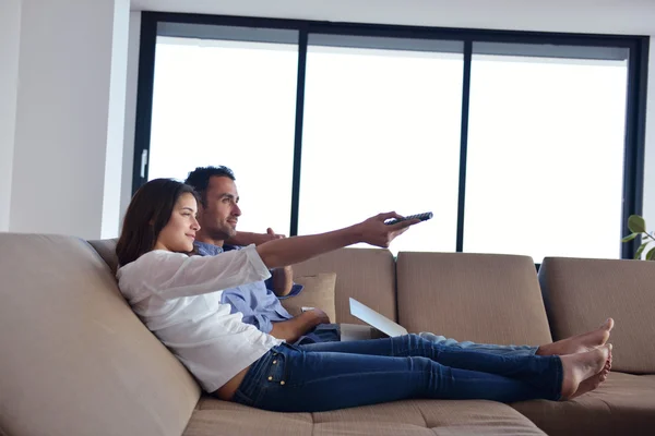 Couple on sofa — Stock Photo, Image