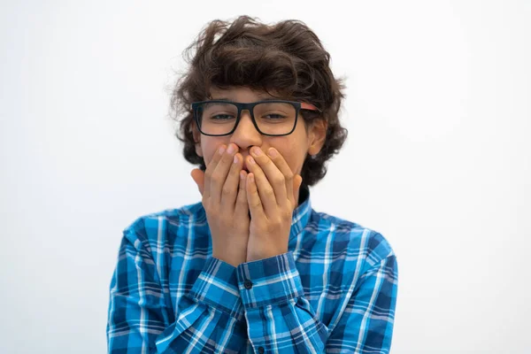 Portrait of smart looking arab teenager with glasses wearing a hat in casual school look isolated on white copy space — Stock Photo, Image