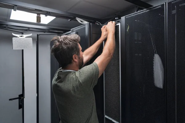 Engineer Working Server Room Data Center Technician Puts Rack New — Stockfoto