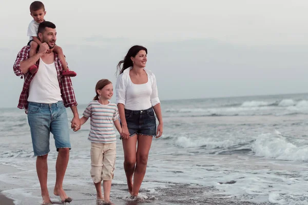 Family have fun and live healthy lifestyle on beach. Selective focus — Stockfoto