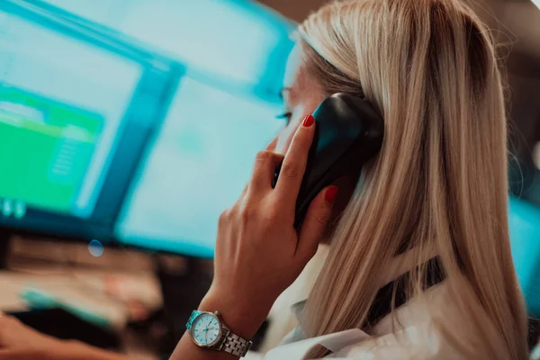 Female Security Guard Operator Talking Phone While Working Workstation Multiple — Stock Fotó