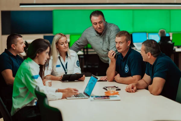Group Security Guards Sitting Having Briefing System Control Room Theyre — Stockfoto