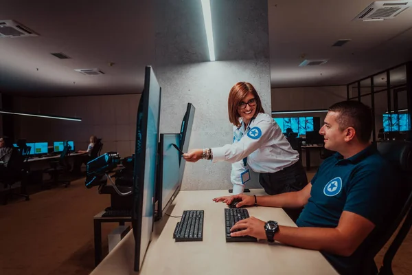 Group Security Data Center Operators Working Cctv Monitoring Room Looking — Fotografia de Stock