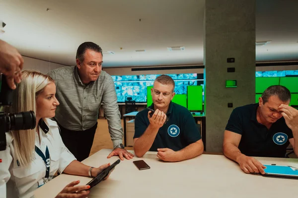 Group Security Guards Sitting Having Briefing System Control Room Theyre — Stockfoto