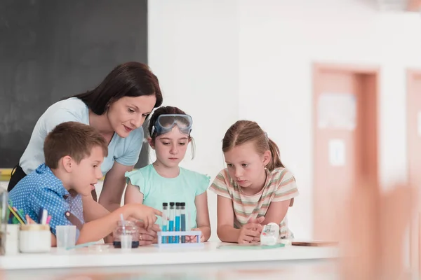 Elementary School Science Classroom Enthusiastic Teacher Explains Chemistry Diverse Group — Stock Photo, Image