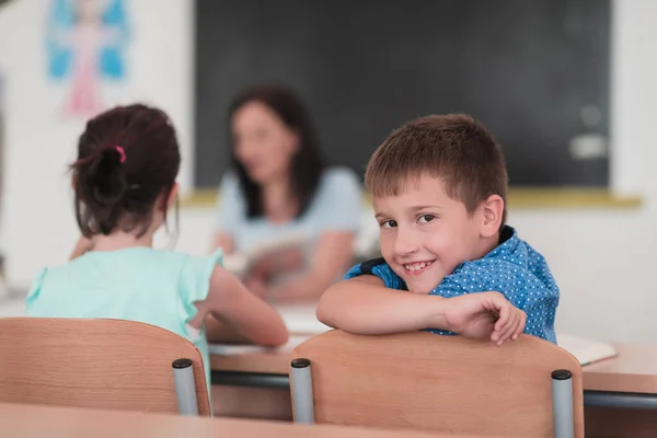 Little Boy Sitting Elementary School Drawing Paper Friends While Sitting — Photo