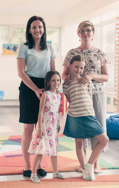 Portrait Mother Her Daughters Modern Preschool Institution Selective Focus High — Foto Stock