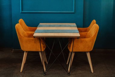 Modern furniture with a matte wall in the background. Selective focus. High quality photo
