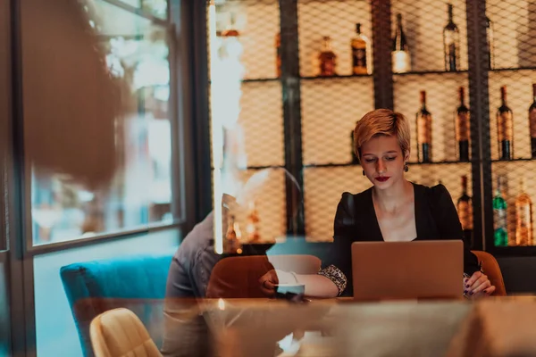 Businesswoman Sitting Cafe While Focused Working Laptop Participating Online Meetings —  Fotos de Stock