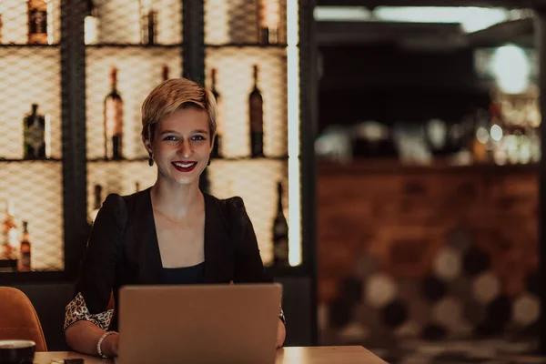 Businesswoman Sitting Cafe While Focused Working Laptop Participating Online Meetings —  Fotos de Stock