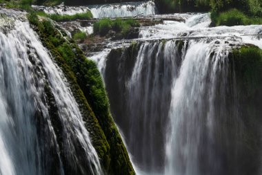 a magnificent waterfall called strbacki buk on the beautifully clean and drinking Una river in Bosnia and Herzegovina in the middle of a forest. High quality photo