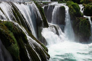 a magnificent waterfall called strbacki buk on the beautifully clean and drinking Una river in Bosnia and Herzegovina in the middle of a forest. High quality photo