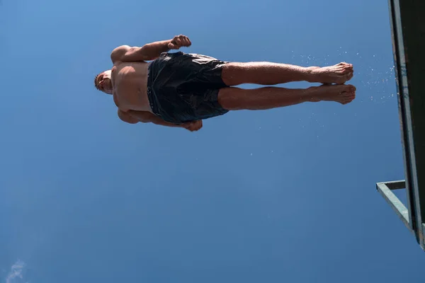 Young Teen Boy Jumping Flying Diving River Clear Blue Sky — Photo