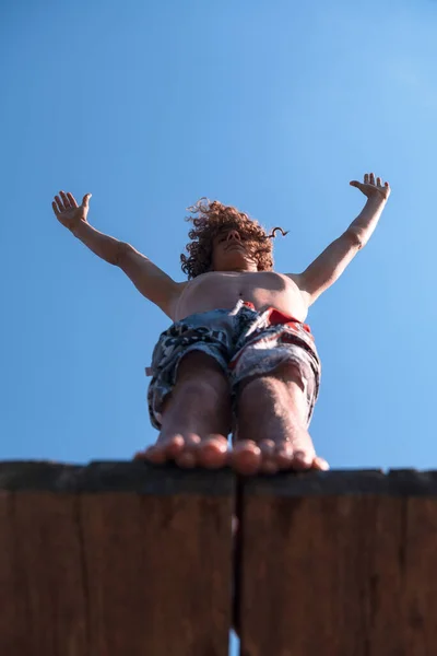 Young Teen Boy Ready Jump River Summer Sunny Day Vacation — ストック写真