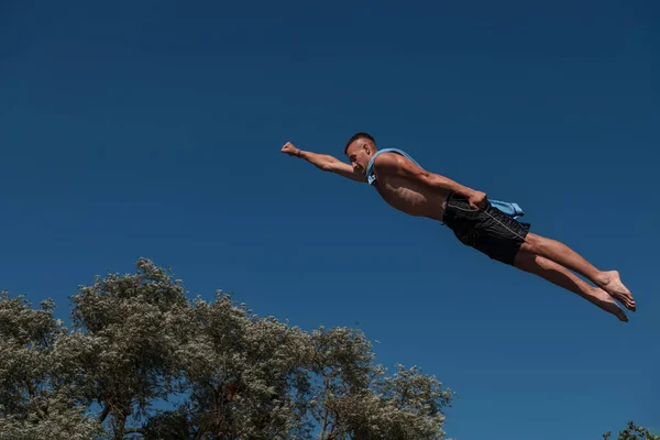 Young Teen Boy Wearing Towel Superhero Scarf Flying Diving River — Fotografia de Stock