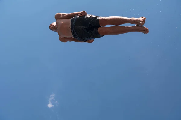 Young Teen Boy Jumping Flying Diving River Clear Blue Sky — Stock Photo, Image