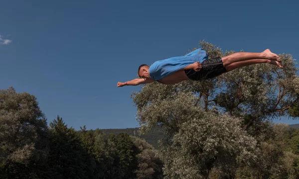 Young Teen Boy Wearing Towel Superhero Scarf Flying Diving River — Foto de Stock