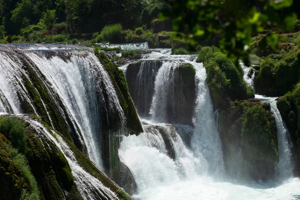 a magnificent waterfall called strbacki buk on the beautifully clean and drinking Una river in Bosnia and Herzegovina in the middle of a forest. High quality photo
