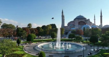Istanbul, Turkey. Sultanahmet area with the Blue Mosque and the Hagia Sophia with a Golden Horn and Bosphorus bridge in the background at sunrise. Cinematic Aerial view. Hi quality 4K footage.