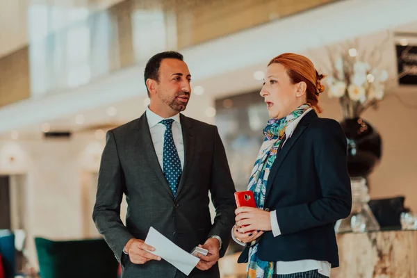 Photo Businessman Businesswoman Discussing Business Projects Modern Corporation Selective Focus — Zdjęcie stockowe