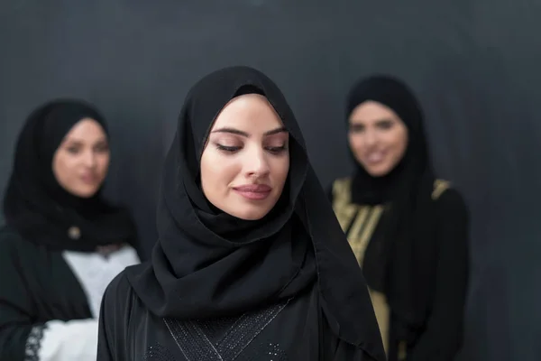 Group Portrait Beautiful Muslim Women Fashionable Dress Hijab Isolated Black — стоковое фото