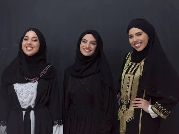 Group Portrait Beautiful Muslim Women Fashionable Dress Hijab Isolated Black — стоковое фото