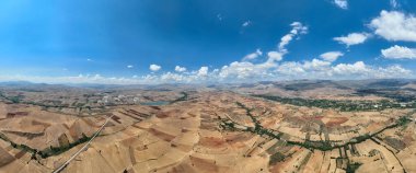 Farm fields Background Texture Aerial top View and lonely try tracking orbiting shoot. Turkey Countryside agricultural farmland near Antalya. High quality 4k footage