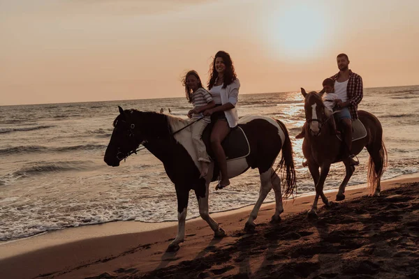Family Spends Time Children While Riding Horses Together Sandy Beach — стоковое фото