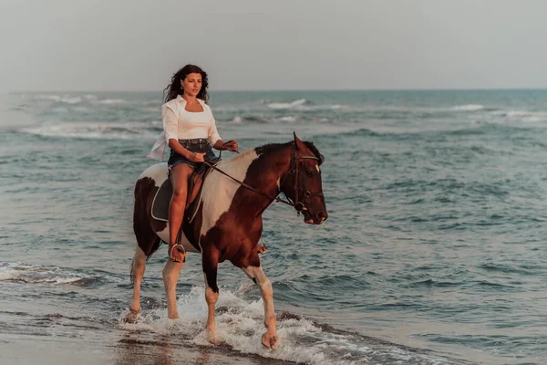 Woman Summer Clothes Enjoys Riding Horse Beautiful Sandy Beach Sunset — Φωτογραφία Αρχείου