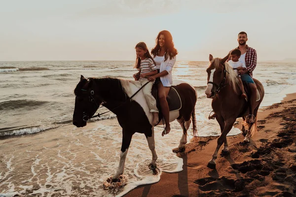 Family Spends Time Children While Riding Horses Together Sandy Beach — стоковое фото