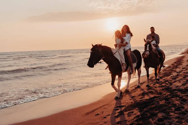 Family Spends Time Children While Riding Horses Together Sandy Beach — стоковое фото