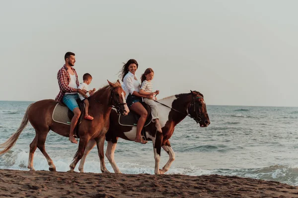 Family Spends Time Children While Riding Horses Together Sandy Beach —  Fotos de Stock