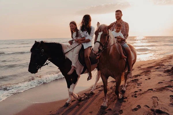 Family Spends Time Children While Riding Horses Together Sandy Beach —  Fotos de Stock