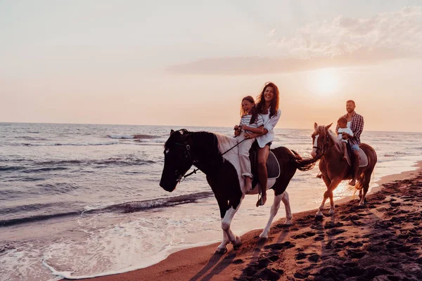 Family Spends Time Children While Riding Horses Together Sandy Beach — стоковое фото