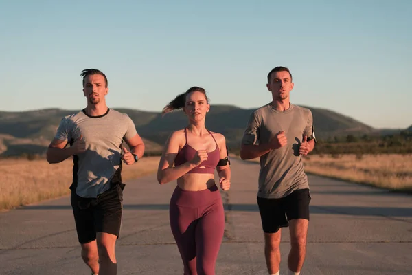 Three Runners Sprinting Outdoors Sportive People Training Urban Area Healthy — Stock Photo, Image