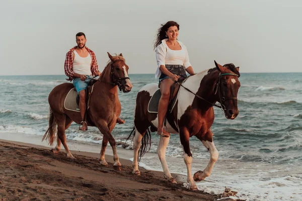 Loving Couple Summer Clothes Riding Horse Sandy Beach Sunset Sea — Stockfoto