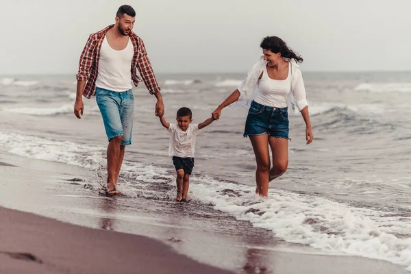 Family Enjoys Vacation Walk Sandy Beach Son Selective Focus High — Stockfoto