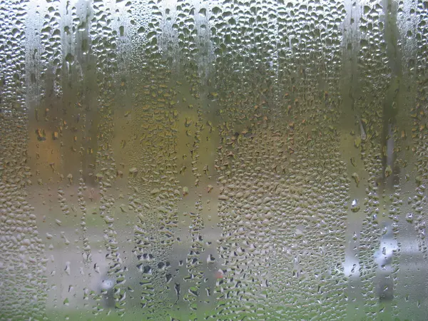 Finestra vetro e gocce di pioggia — Foto Stock