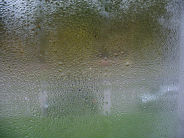 Pencere cam ve yağmur damlaları — Stok fotoğraf