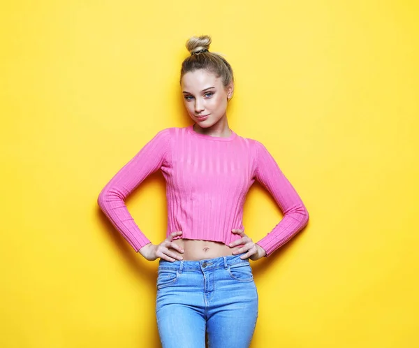Young Cheerful Blonde Womanwearing Pink Sweater Smiling Yellow Background — Stock Photo, Image